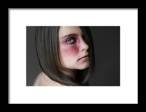 Looking Over Shoulder Framed Print featuring the photograph Portrait of woman by Lauren Bates