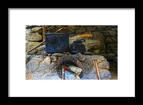 Pots Framed Print featuring the photograph Pots on the stove by Alexey Stiop