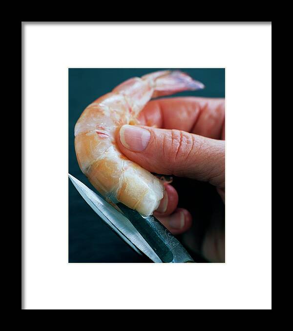 Cooking Framed Print featuring the photograph Preparing Shrimp by Romulo Yanes