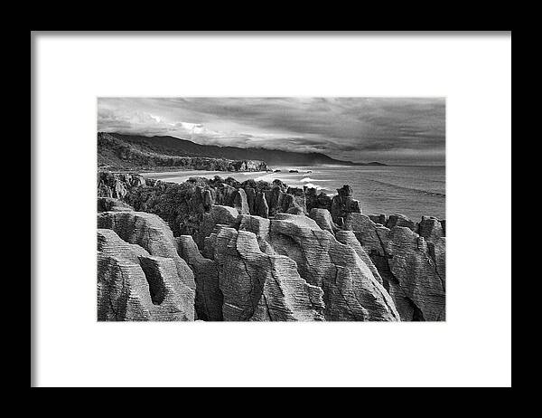 New Zealand Framed Print featuring the photograph Punakaiki Pancake Rocks - black and white by Stuart Litoff