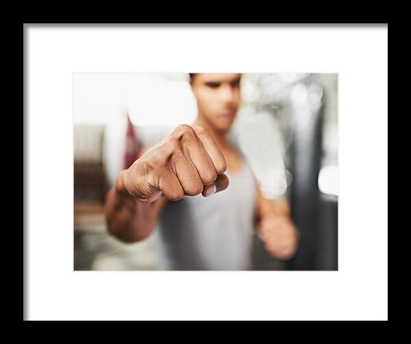 Expertise Framed Print featuring the photograph Pure power by PeopleImages