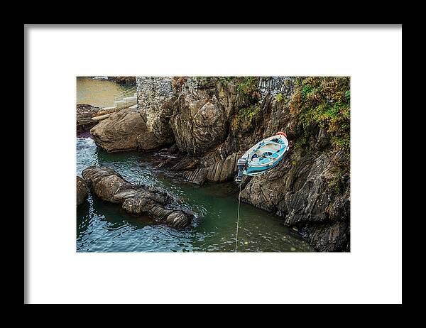 Motorboat Framed Print featuring the photograph Putting Boat Into Sea by Fancy Yan
