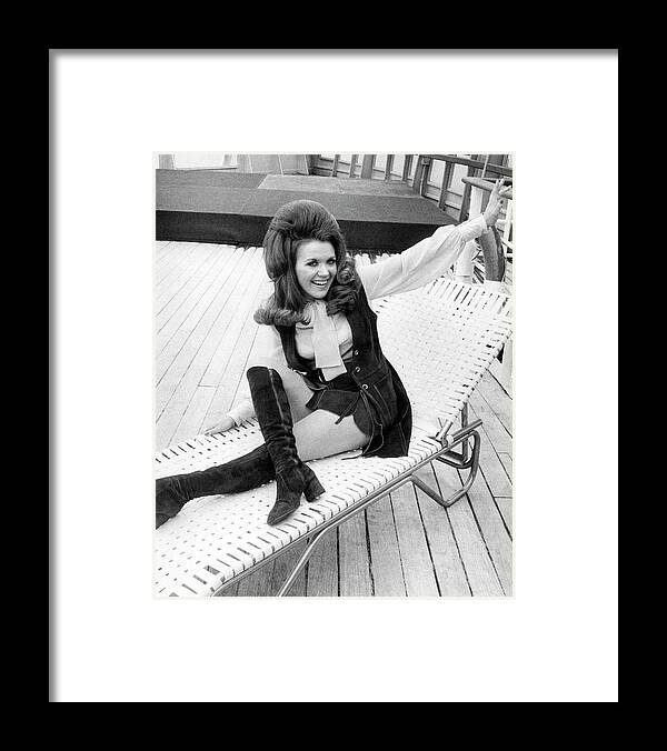 1 Person Framed Print featuring the photograph QE 2 Fashion Lass by Underwood Archives