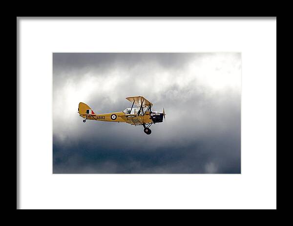 Bi-plane Framed Print featuring the photograph Raacing the Storm by Alan Norsworthy