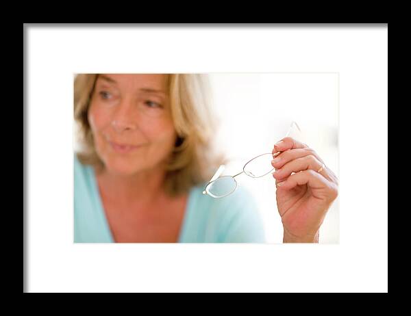 Human Framed Print featuring the photograph Reading Glasses by Ian Hooton/science Photo Library