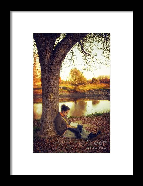 Romantic Framed Print featuring the photograph Reading Under the Tree by Carlos Caetano