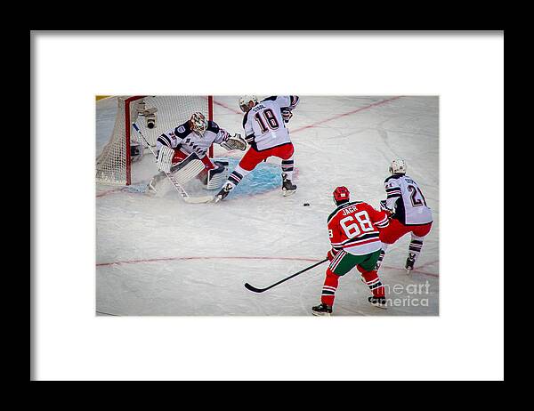 Faceoff Framed Print featuring the photograph Rebound by David Rucker