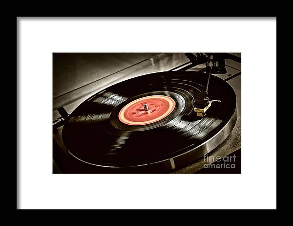 Vinyl Framed Print featuring the photograph Record on turntable by Elena Elisseeva