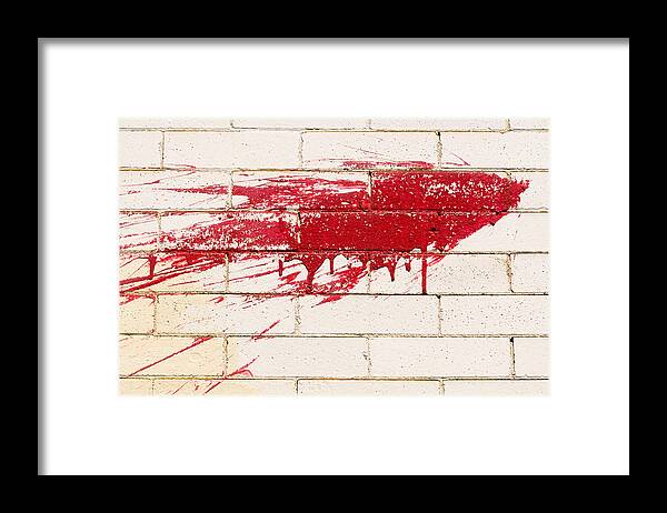 Abstract Composition Framed Print featuring the photograph Red Splash on Brick Wall by Lynn Hansen