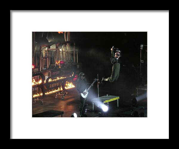 Band Framed Print featuring the photograph Red's lead singer can fly by Aaron Martens