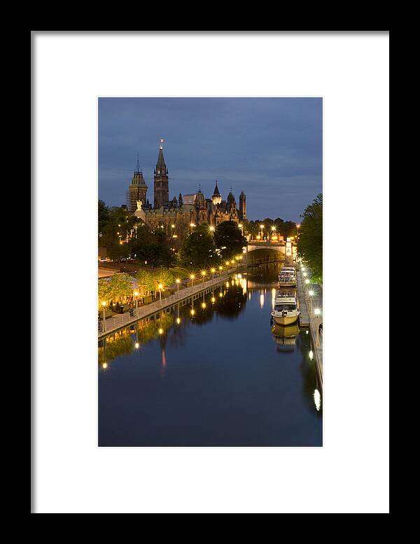 Pixels Framed Print featuring the photograph Rideau Canal and the Parliament Buildings at Night by Rob Huntley