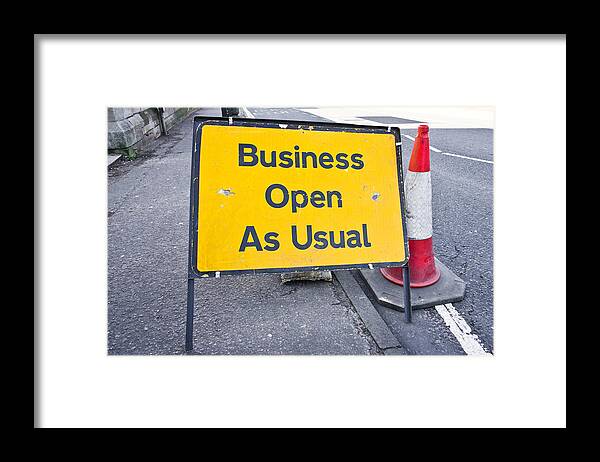 Business Framed Print featuring the photograph Road sign by Tom Gowanlock