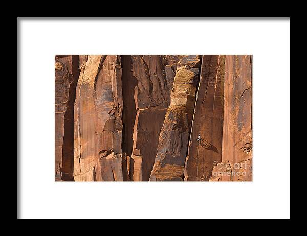 00559216 Framed Print featuring the photograph Rock Climber Indian Creek Utah by Yva Momatiuk and John Eastcott