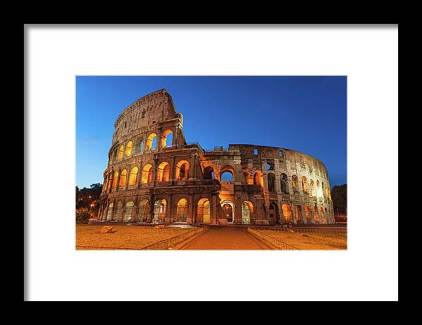 Arch Framed Print featuring the photograph Rome Colosseum Ancient Amphitheatre by Fotovoyager