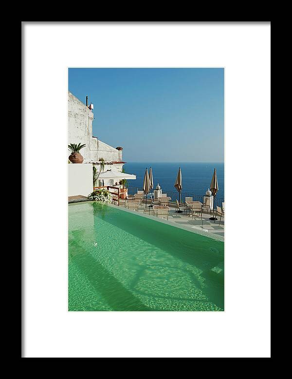 Swimming Pool Framed Print featuring the photograph Rooftop Swimming Pool At Hotel Punta by Dallas Stribley