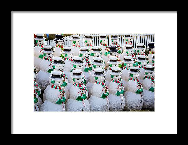 Rows Framed Print featuring the photograph Rows of snowmen by Garry Gay