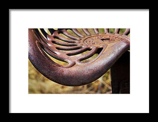 Tractor Framed Print featuring the photograph Rusty Tractor Seat by Phyllis Denton