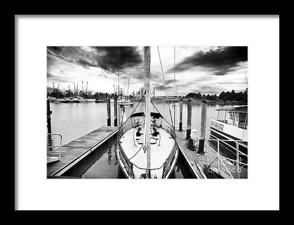 Sailboat Docked Framed Print featuring the photograph Sailboat Docked by John Rizzuto