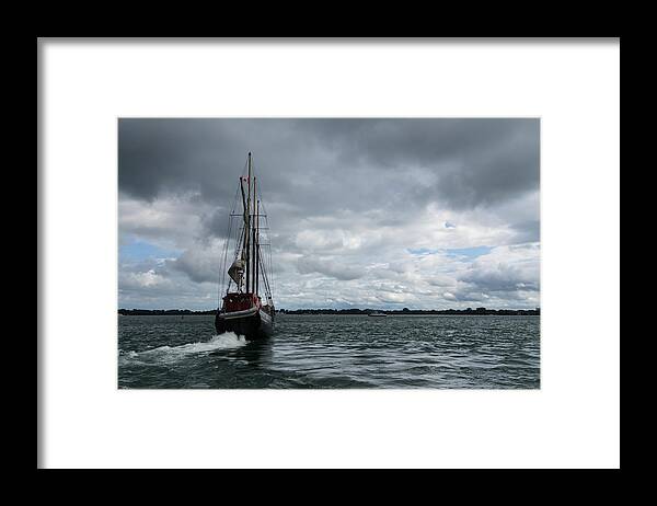 Tall Ship Framed Print featuring the photograph Sailing Into the Storm by Georgia Mizuleva