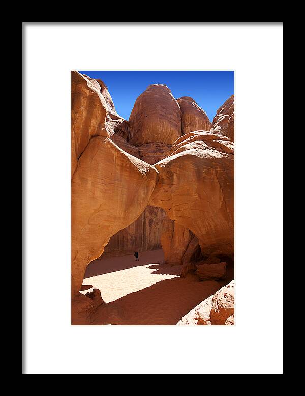 Desert Scene Framed Print featuring the photograph Sand Dune Arch with Gary by Mike McGlothlen