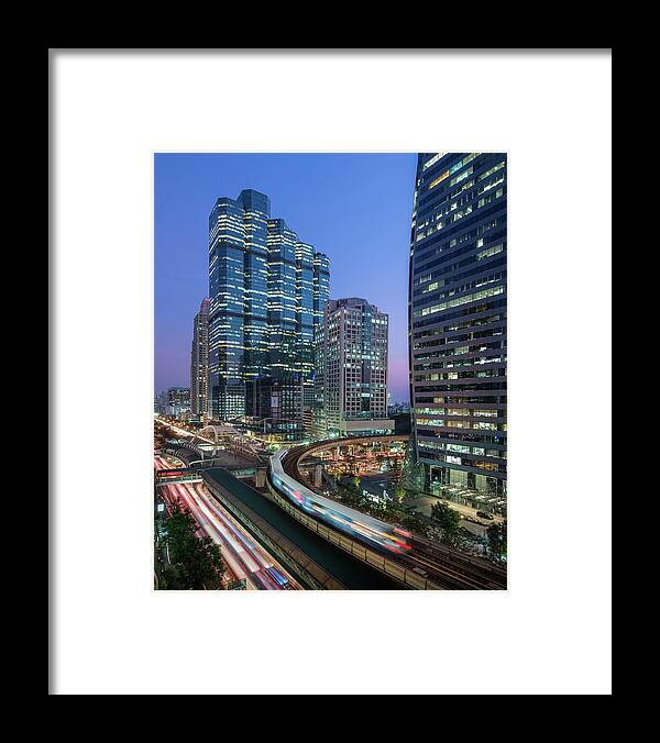 Elevated Railway Track Framed Print featuring the photograph Sathorn Intersection With Sky Train by Thanapol Marattana