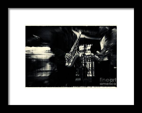Filmnoir Framed Print featuring the photograph Saxophone at Columbus Circle New York City by Sabine Jacobs