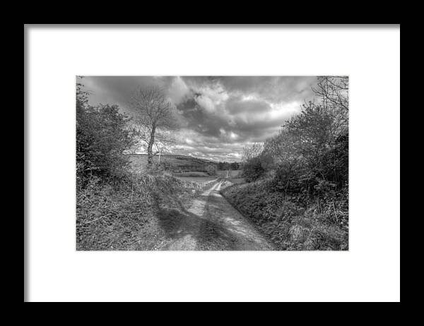 Beautiful Ireland Framed Print featuring the photograph Scenic country road by John Quinn