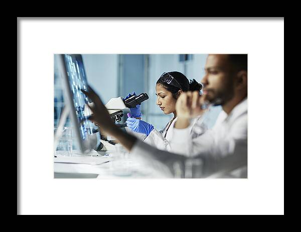 Medical Research Framed Print featuring the photograph Scientist Working on Computer In Modern Laboratory by Poba