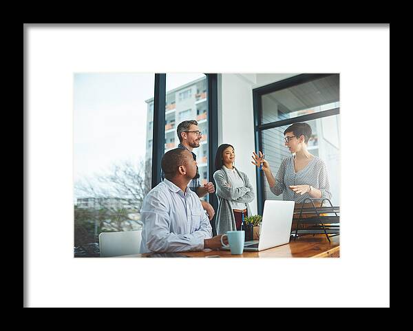 Expertise Framed Print featuring the photograph She's bringing some of her bright ideas to the front by Peopleimages