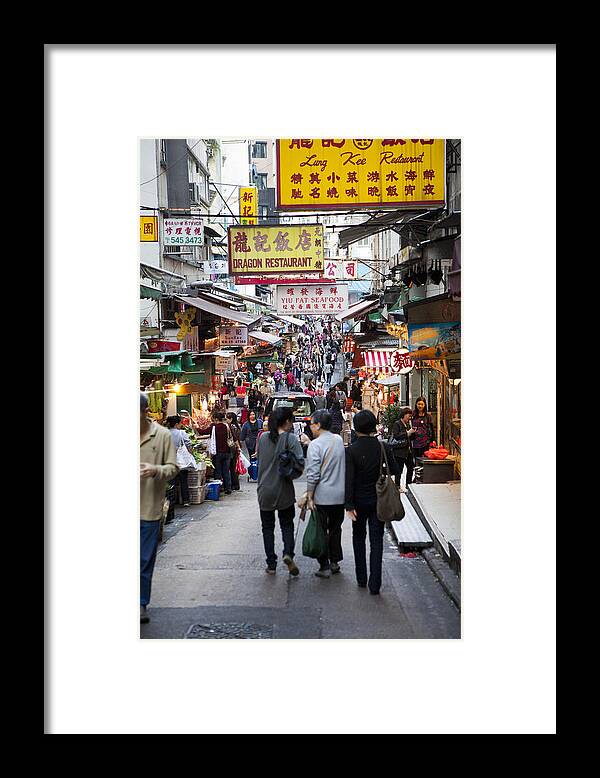 Built Structure Framed Print featuring the photograph Shops And Signs In Street, Hong Kong by Cultura Rm Exclusive/nancy Honey