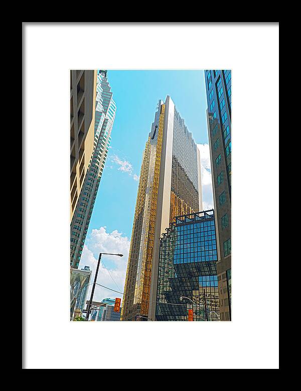 Gold Framed Print featuring the photograph Skysrapers in downtown Toronto Canada. by Marek Poplawski