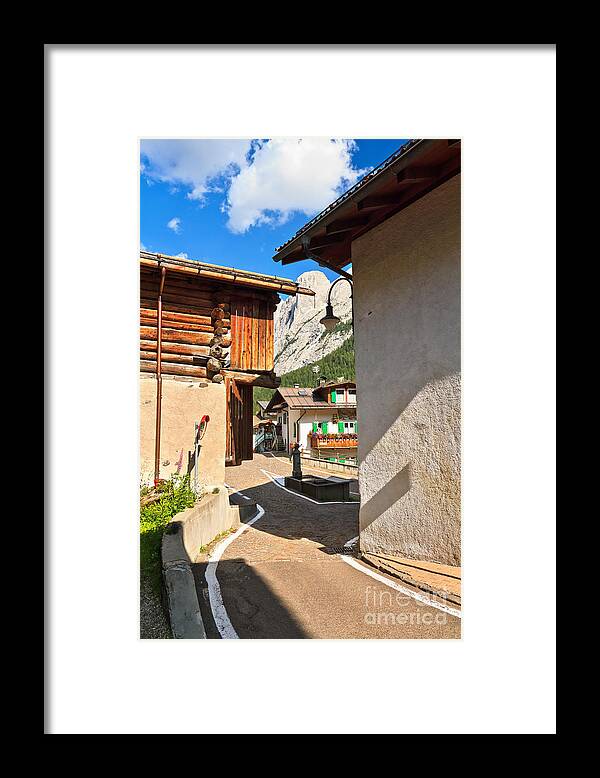 Ancient Framed Print featuring the photograph small street in Penia by Antonio Scarpi