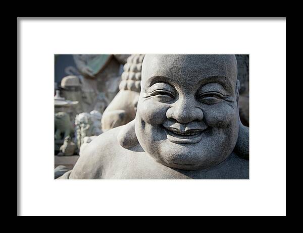 Chinese Culture Framed Print featuring the photograph Smiling Stone Buddha Statue by Blake Kent / Design Pics