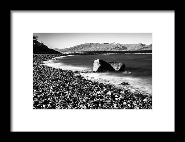 Black And White Framed Print featuring the photograph Smooth Water Rocky Beach and Mountains by Dennis Dame