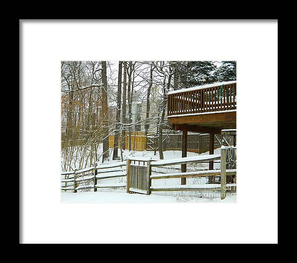 Snow Covered Fences Framed Print featuring the photograph Snow Covered Fences by Emmy Vickers
