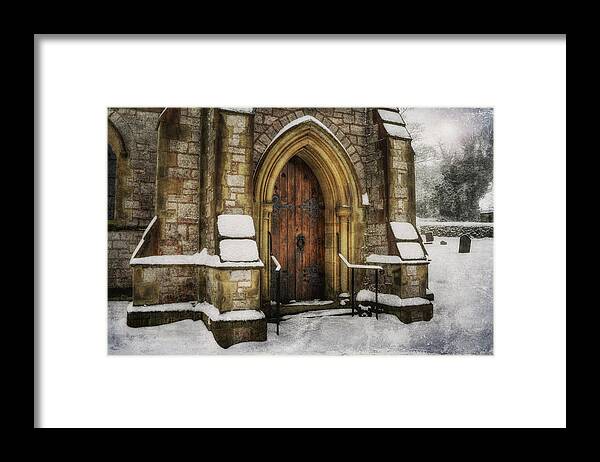 Church Framed Print featuring the photograph Snowy Church Door by Ian Mitchell