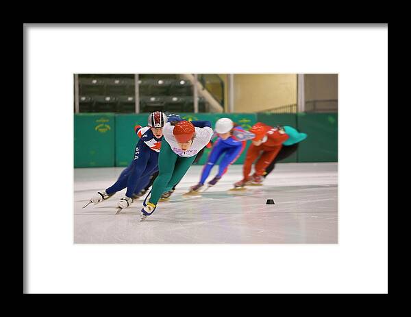 Small Group Of People Framed Print featuring the photograph Speed Skaters Training by Jim West