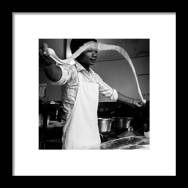 Black Framed Print featuring the photograph Spinning Noodles by Lauren Rathvon