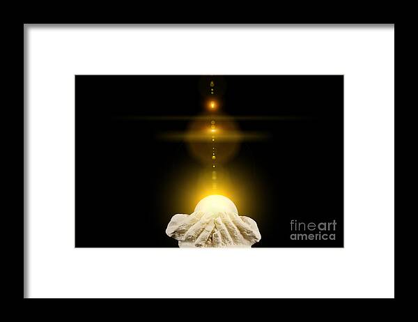 God Framed Print featuring the photograph Spiritual healing light in cupped hands on black by Simon Bratt