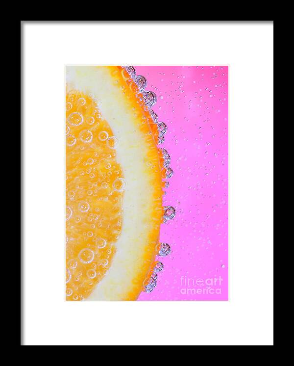 Macro Framed Print featuring the photograph Splash of orange by Ruth Jolly