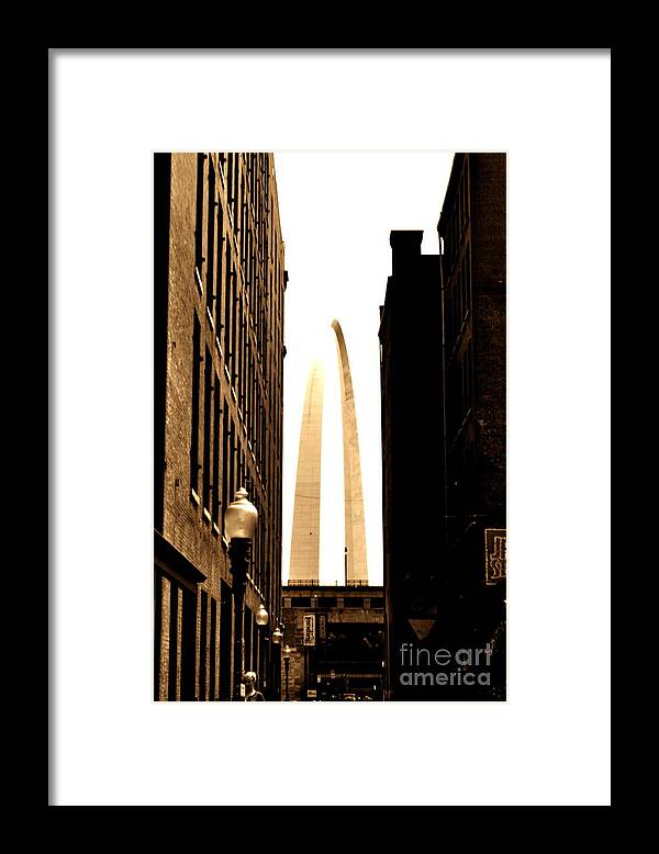 St. Louis Framed Print featuring the photograph St. Louis Arch Through Buildings by Cat Rondeau