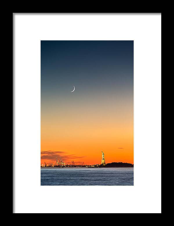 America Framed Print featuring the photograph Statue of Liberty under a crescent moon by Mihai Andritoiu