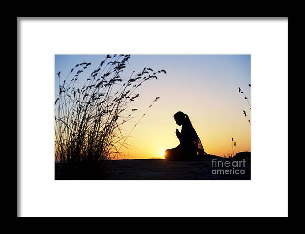Indian Girl Framed Print featuring the photograph Stillness of Prayer by Tim Gainey