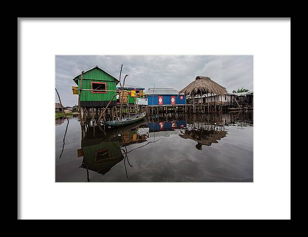 Tranquility Framed Print featuring the photograph Stilts by Anthony Pappone