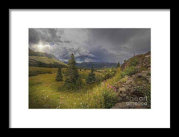 Storm Framed Print featuring the photograph Storm in the distance by Tim Wemple