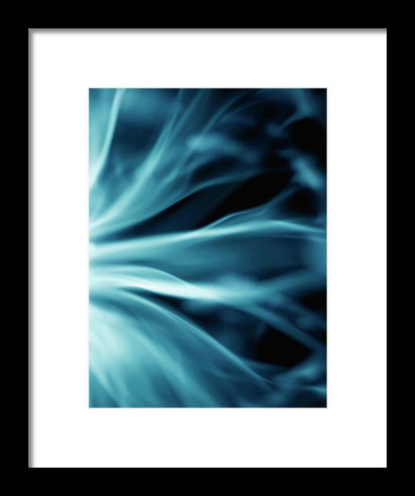 Majestic Framed Print featuring the photograph Streams Of Ethereal Light Against A by Steven Puetzer