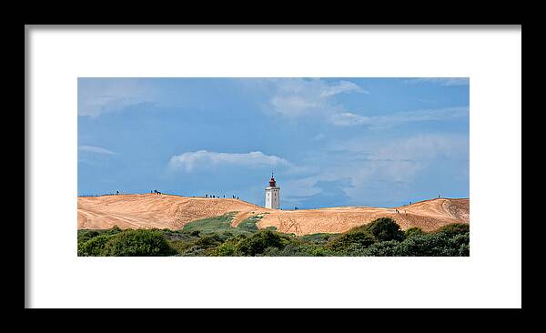 Lighthouse Framed Print featuring the photograph Lighthouse on sand dunes by Mike Santis