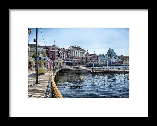 Boardwalk Framed Print featuring the photograph Strolling On The Boardwalk At Disney World by Thomas Woolworth