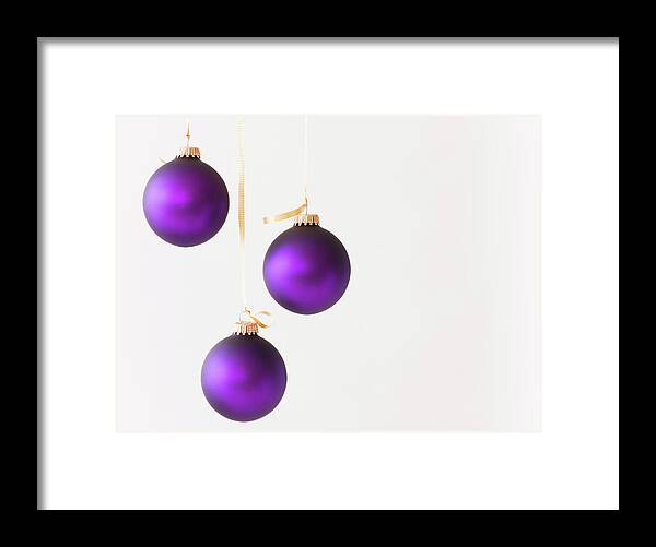 Hanging Framed Print featuring the photograph Studio Shot Of Purple Christmas by Daniel Grill