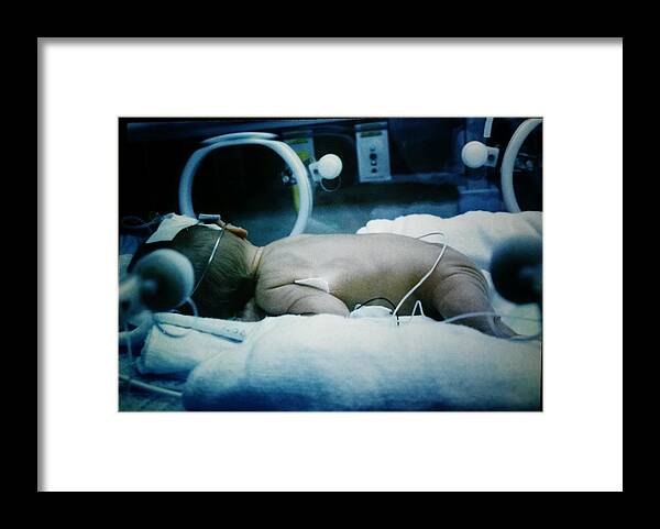 Baby Framed Print featuring the photograph Sunbathing Preemie by Jenn Beck